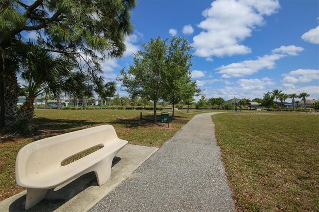 13401 Galveston Ave, Port Charlotte, FL 33981 - surrounding community featuring a lawn