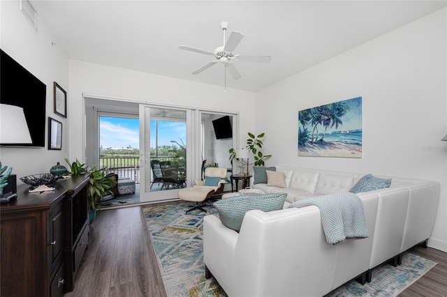 11100 Hacienda Del Mar Blvd Unit 202, Placida, FL 33946 - living area featuring a ceiling fan, dark wood-style flooring, and visible vents