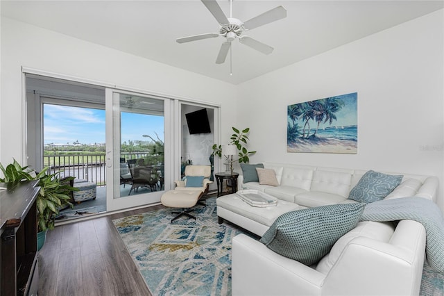 11100 Hacienda Del Mar Blvd Unit 202, Placida, FL 33946 - living area with ceiling fan and wood finished floors