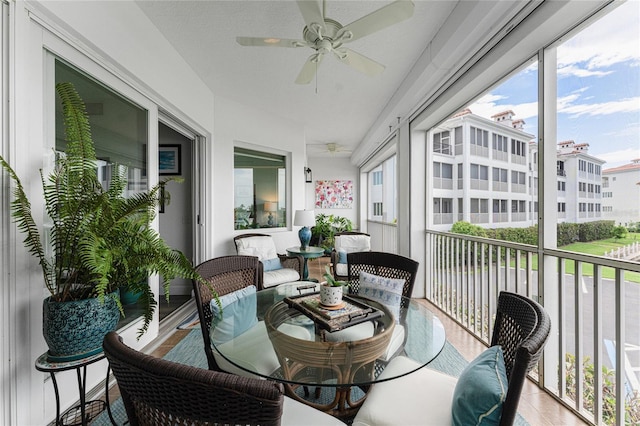11100 Hacienda Del Mar Blvd Unit 202, Placida, FL 33946 - sunroom featuring a ceiling fan