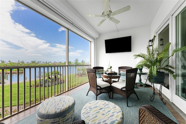 11100 Hacienda Del Mar Blvd Unit 202, Placida, FL 33946 - sunroom featuring a water view
