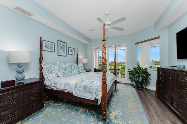 11100 Hacienda Del Mar Blvd Unit 202, Placida, FL 33946 - bedroom with baseboards, access to exterior, visible vents, a ceiling fan, and wood finished floors
