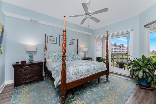 11100 Hacienda Del Mar Blvd Unit 202, Placida, FL 33946 - bedroom with access to exterior, wood finished floors, baseboards, visible vents, and ceiling fan