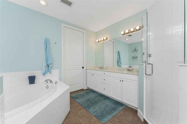 11100 Hacienda Del Mar Blvd Unit 202, Placida, FL 33946 - bathroom featuring tile patterned floors, a sink, a garden tub, a shower stall, and visible vents