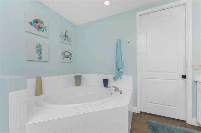 11100 Hacienda Del Mar Blvd Unit 202, Placida, FL 33946 - bathroom with tile patterned flooring and a bath