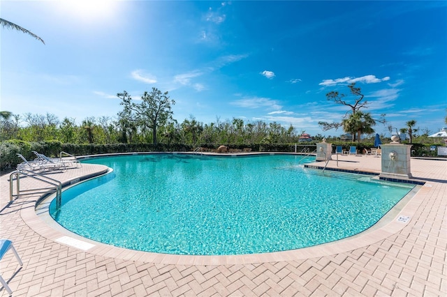 11100 Hacienda Del Mar Blvd Unit 202, Placida, FL 33946 - pool with a patio