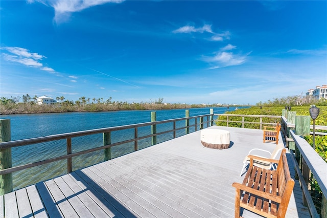 11100 Hacienda Del Mar Blvd Unit 202, Placida, FL 33946 - dock area with a deck with water view
