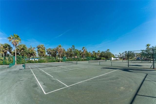 11100 Hacienda Del Mar Blvd Unit 202, Placida, FL 33946 - view of tennis court with fence