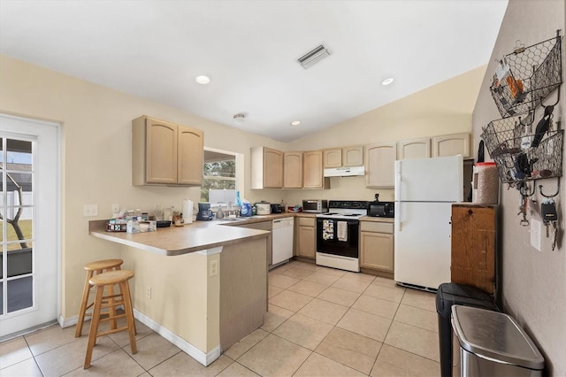 kitchen featuring visible vents, light countertops, white appliances, a peninsula, and under cabinet range hood