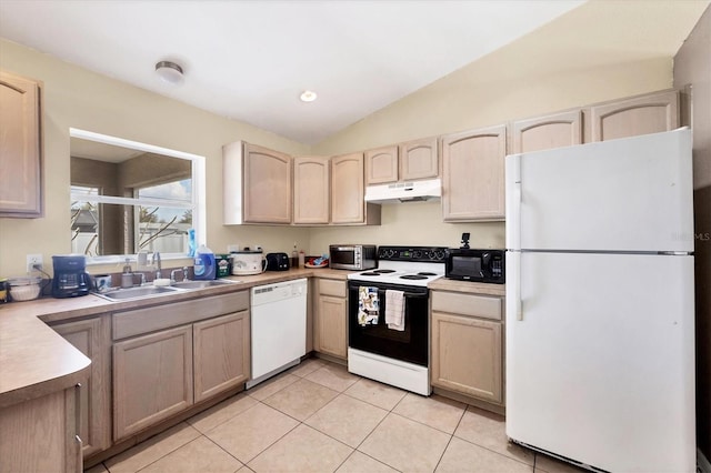 kitchen with light countertops, white appliances, light brown cabinetry, and under cabinet range hood