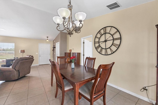 dining space with visible vents, a notable chandelier, baseboards, and light tile patterned floors