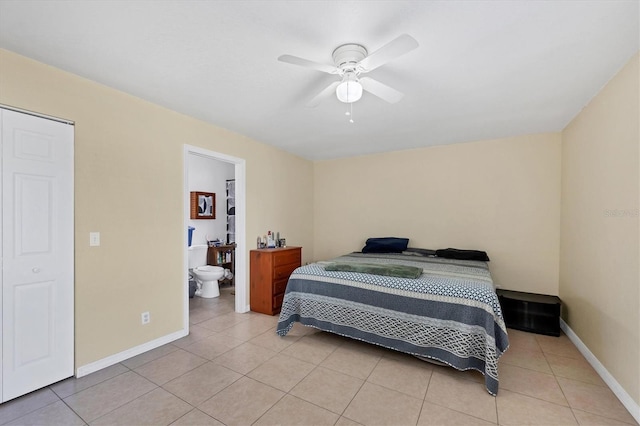 bedroom with light tile patterned floors, ceiling fan, and baseboards