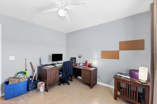 office area featuring light tile patterned flooring, ceiling fan, and baseboards