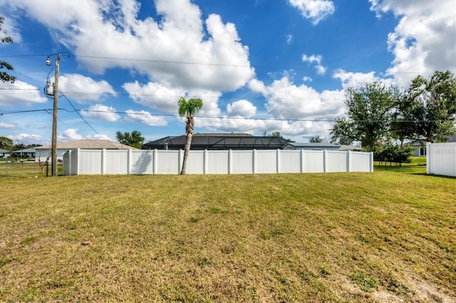 view of yard with fence