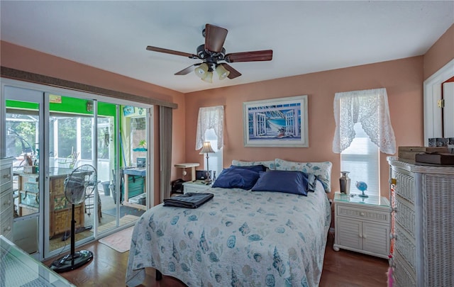 bedroom featuring a ceiling fan, wood finished floors, and access to exterior