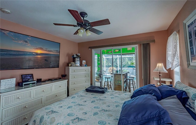 bedroom featuring access to exterior and ceiling fan