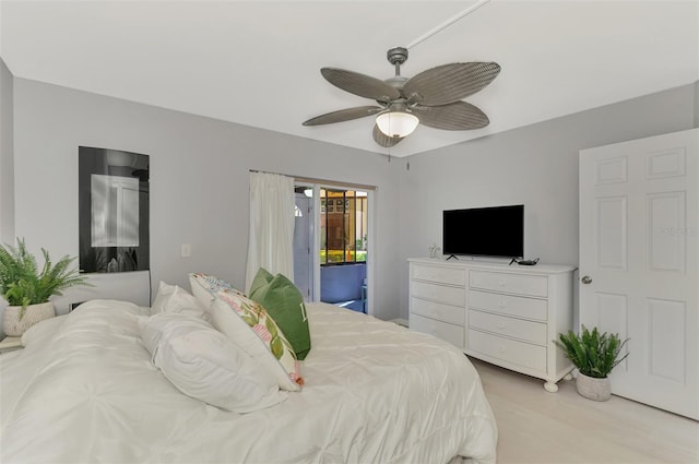 bedroom featuring ceiling fan and access to exterior