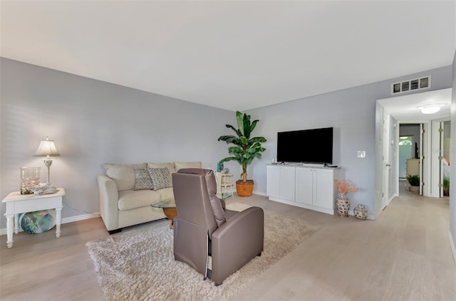 living room with light wood-type flooring