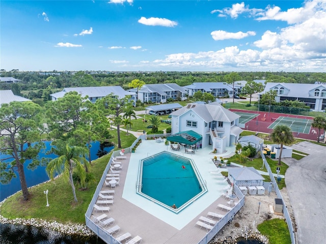 birds eye view of property featuring a water view