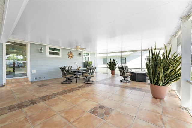 view of patio / terrace featuring outdoor dining area and a ceiling fan