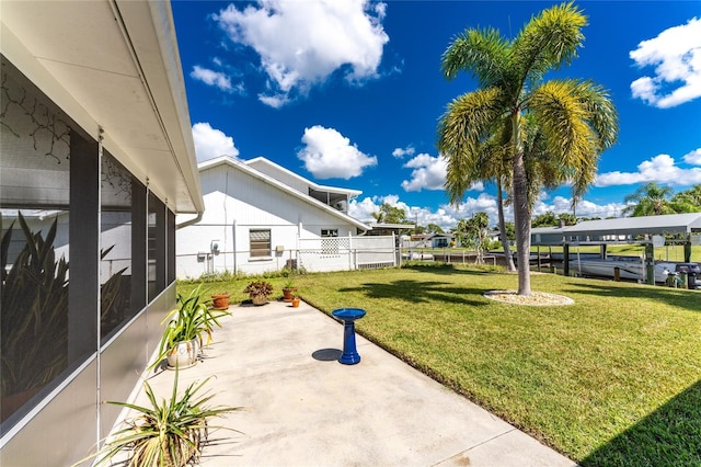 view of yard with a patio and fence