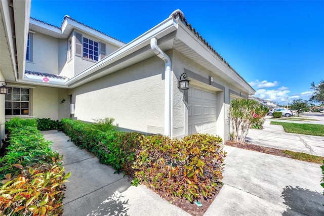 view of home's exterior featuring a garage