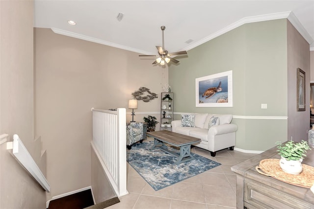 tiled living room featuring crown molding and ceiling fan