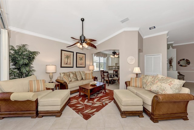 tiled living room featuring ornamental molding, lofted ceiling, and ceiling fan