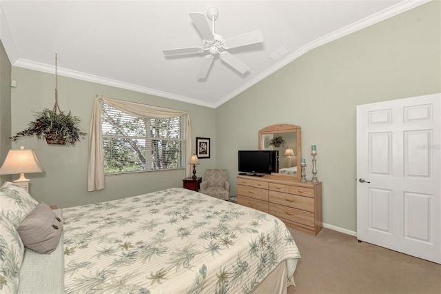 carpeted bedroom featuring vaulted ceiling, ceiling fan, and crown molding