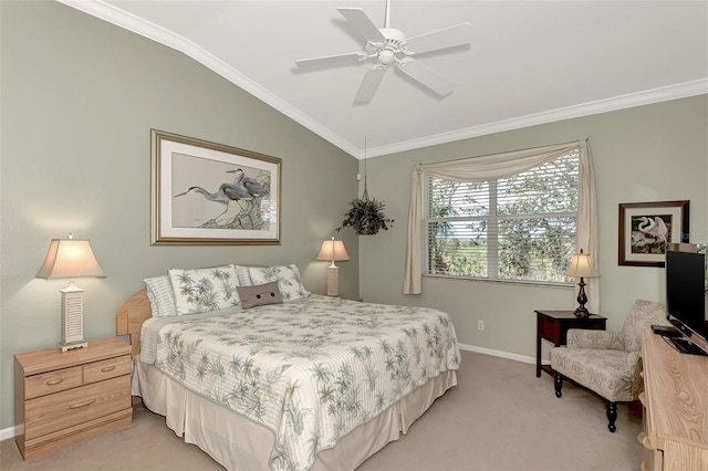 carpeted bedroom with ceiling fan, ornamental molding, and vaulted ceiling