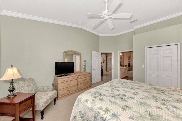 carpeted bedroom featuring ceiling fan, ornamental molding, and a closet