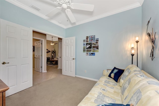 living room featuring ornamental molding, carpet, and ceiling fan