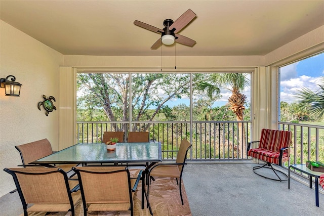 sunroom / solarium with ceiling fan