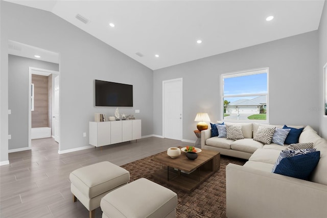 living room with lofted ceiling