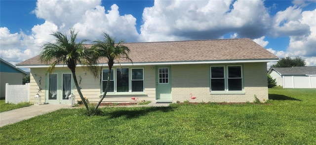 view of front of house with a front lawn