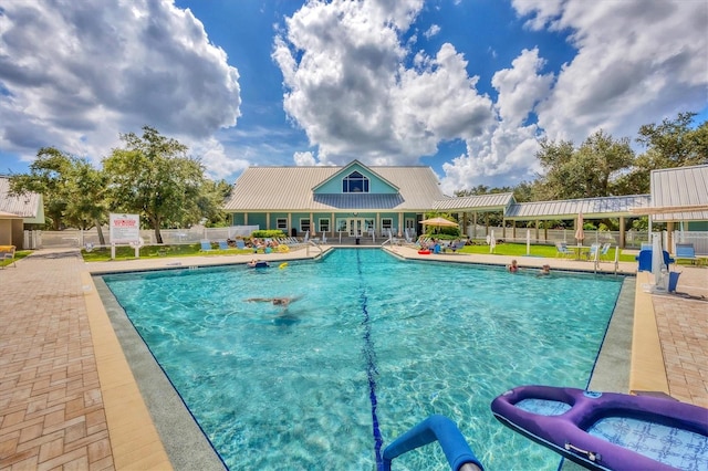 view of pool with a patio area