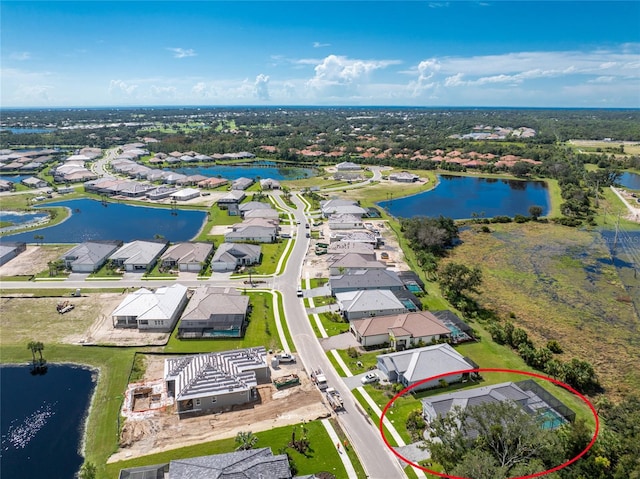 aerial view featuring a water view