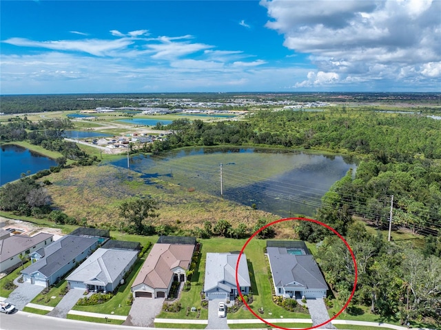 drone / aerial view featuring a water view