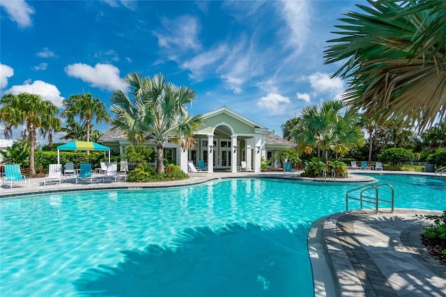 view of swimming pool featuring a patio area