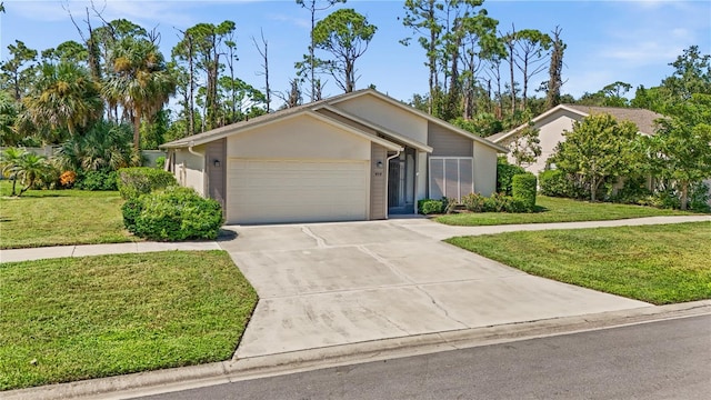 ranch-style home with a front lawn and a garage