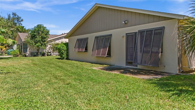 view of home's exterior featuring a yard