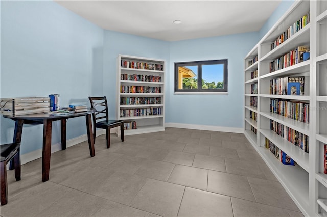 sitting room with light tile patterned flooring