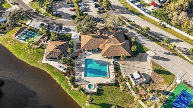 drone / aerial view with a water view