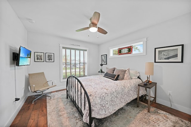 bedroom featuring hardwood / wood-style floors and ceiling fan