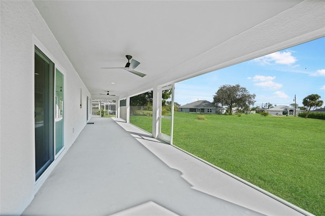 view of patio with ceiling fan