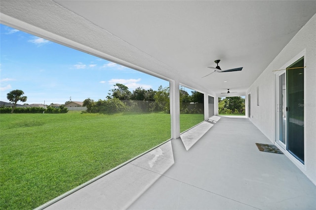 view of patio featuring ceiling fan