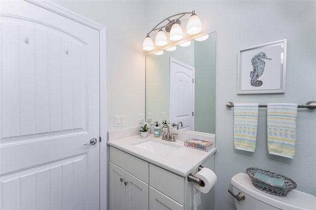 552 Box Elder Ct, Englewood, FL 34223 - bathroom featuring vanity and toilet