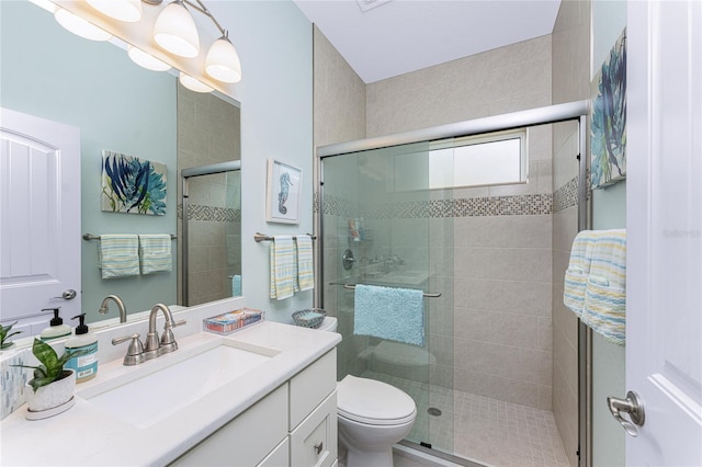552 Box Elder Ct, Englewood, FL 34223 - full bath featuring vanity, toilet, and a stall shower