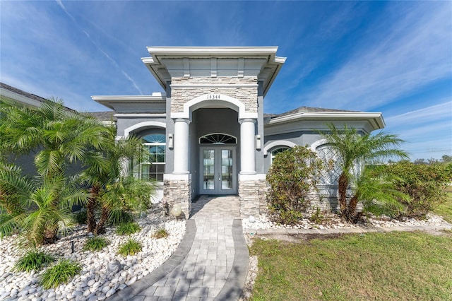 view of exterior entry with french doors