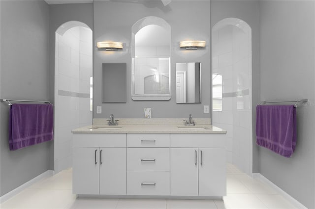 14344 Amestoy Ave, Port Charlotte, FL 33981 - bathroom with tile patterned floors, double vanity, a sink, and walk in shower